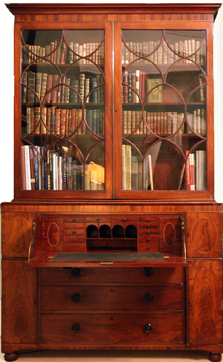 An important large George III period inlaid mahogany Bookcase Secretaire,
the two astragal glazed