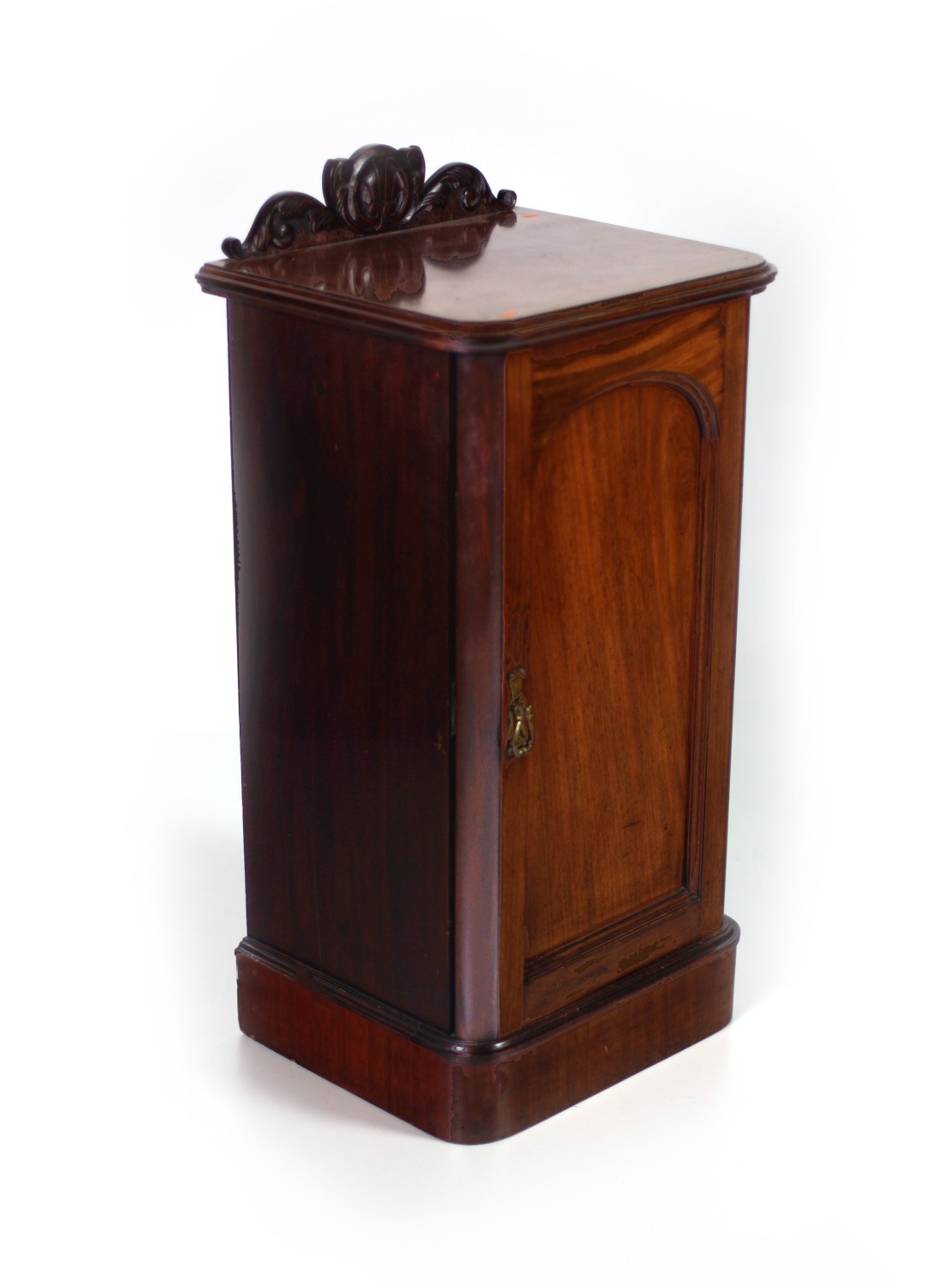 A good quality heavy Victorian mahogany Bedside Locker,
with carved back over a single panel door on