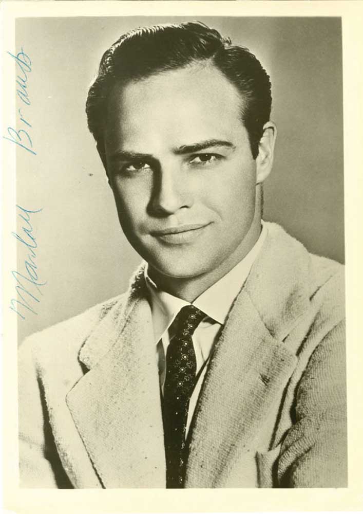 BRANDO, MARLON Photograph Signed - (SP) A vintage black and white 7x5" head and shoulders shot of