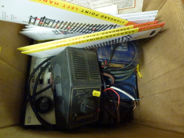 Box of Assorted Railway Track and Power Packs