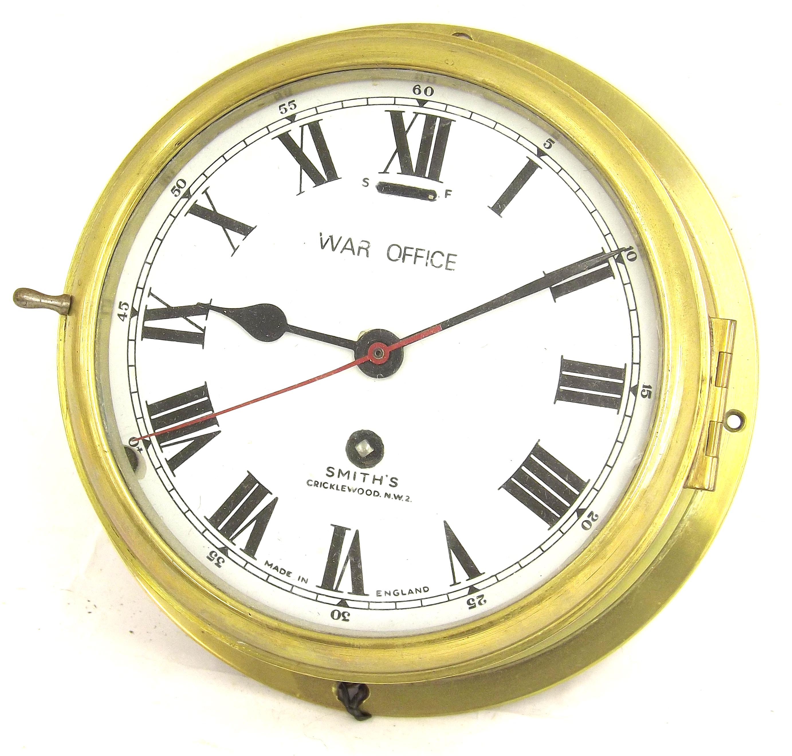 Ship`s brass bulkhead timepiece, the 6.5" dial signed War Office, Smith`s, Cricklewood, N.W.2,