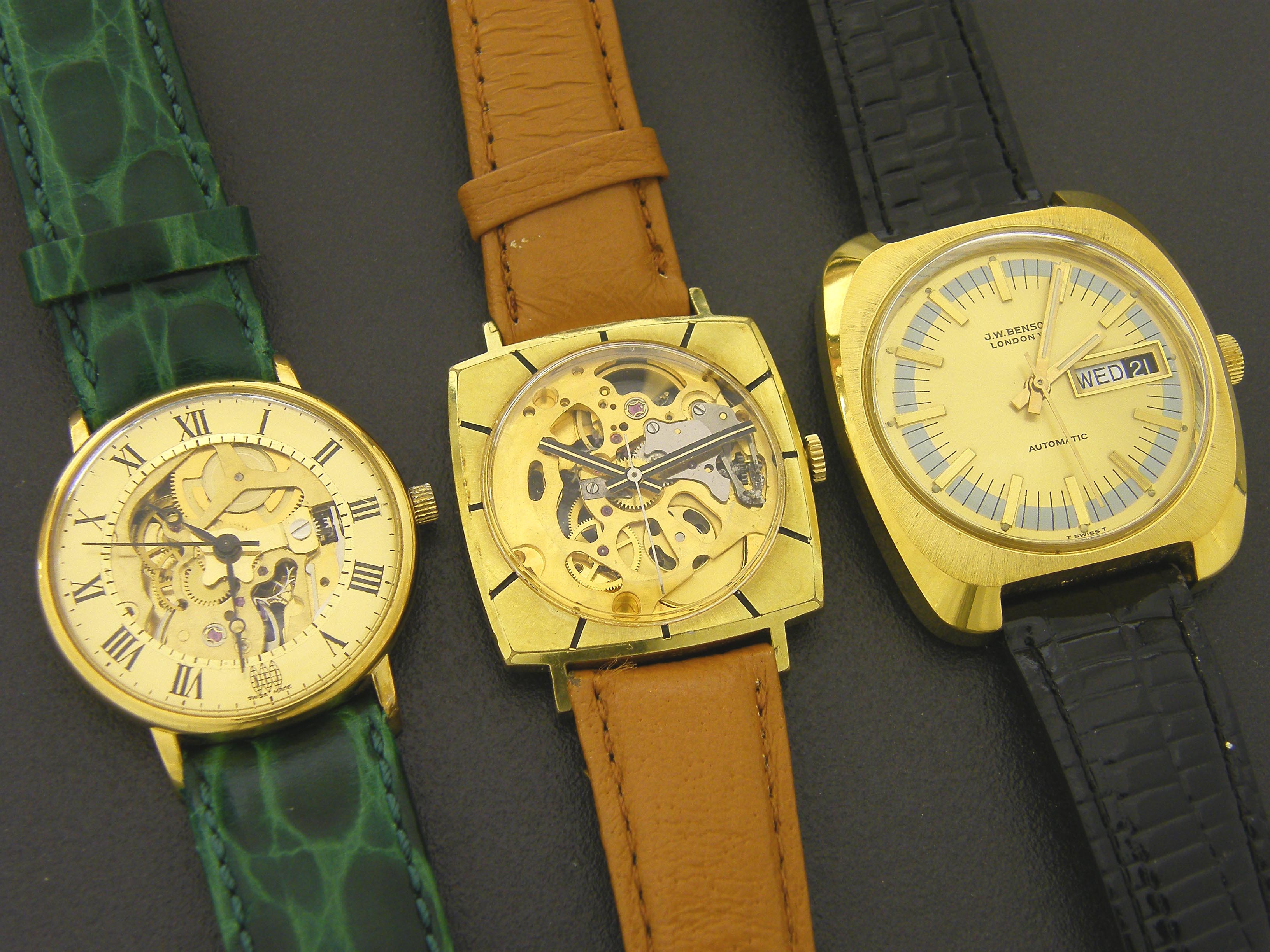 Three gold plated gentlemen`s wristwatches including a J W Benson automatic day-date wristwatch