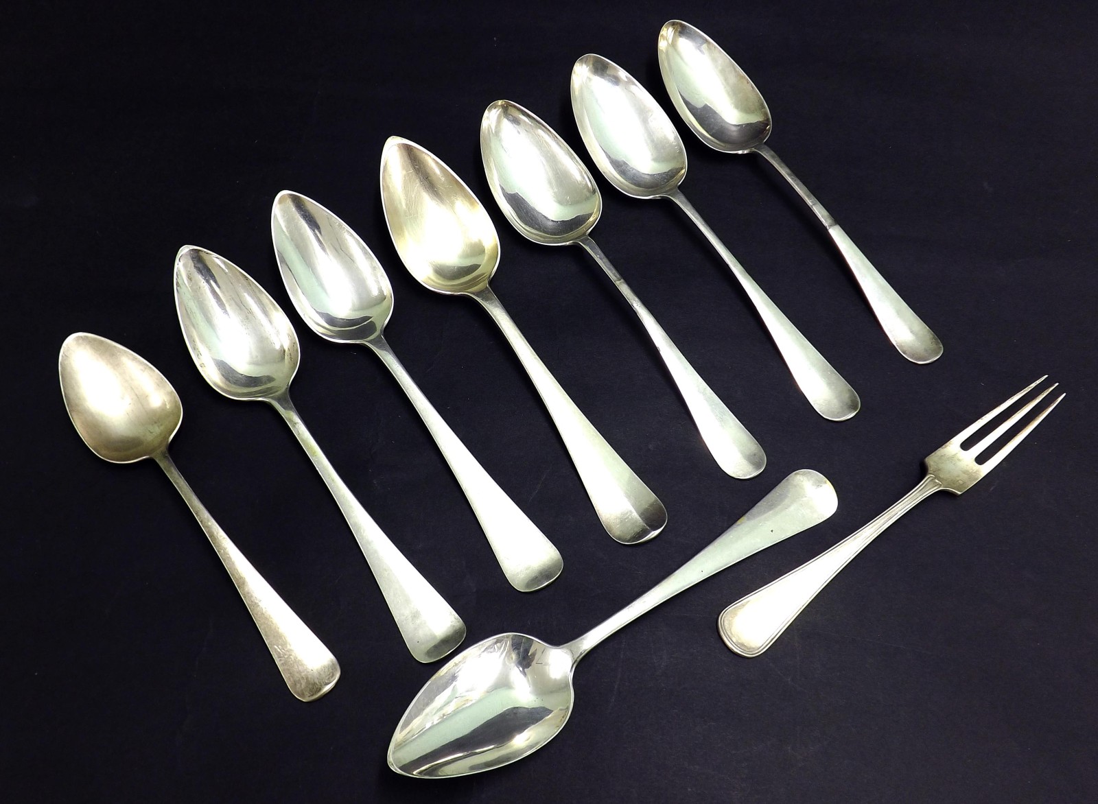 Collection of eight various French silver tablespoons; together with a French silver dessert fork,