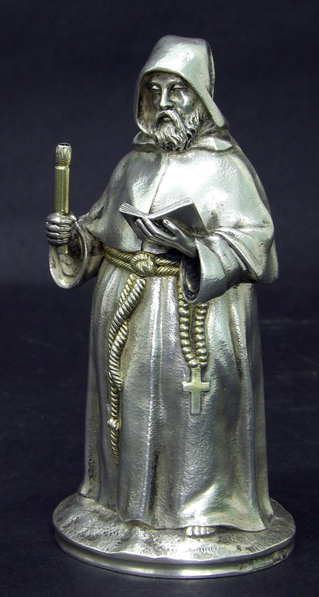 Interesting and rare Russian silver trinket box in the form of a monk reading a book, with gilded