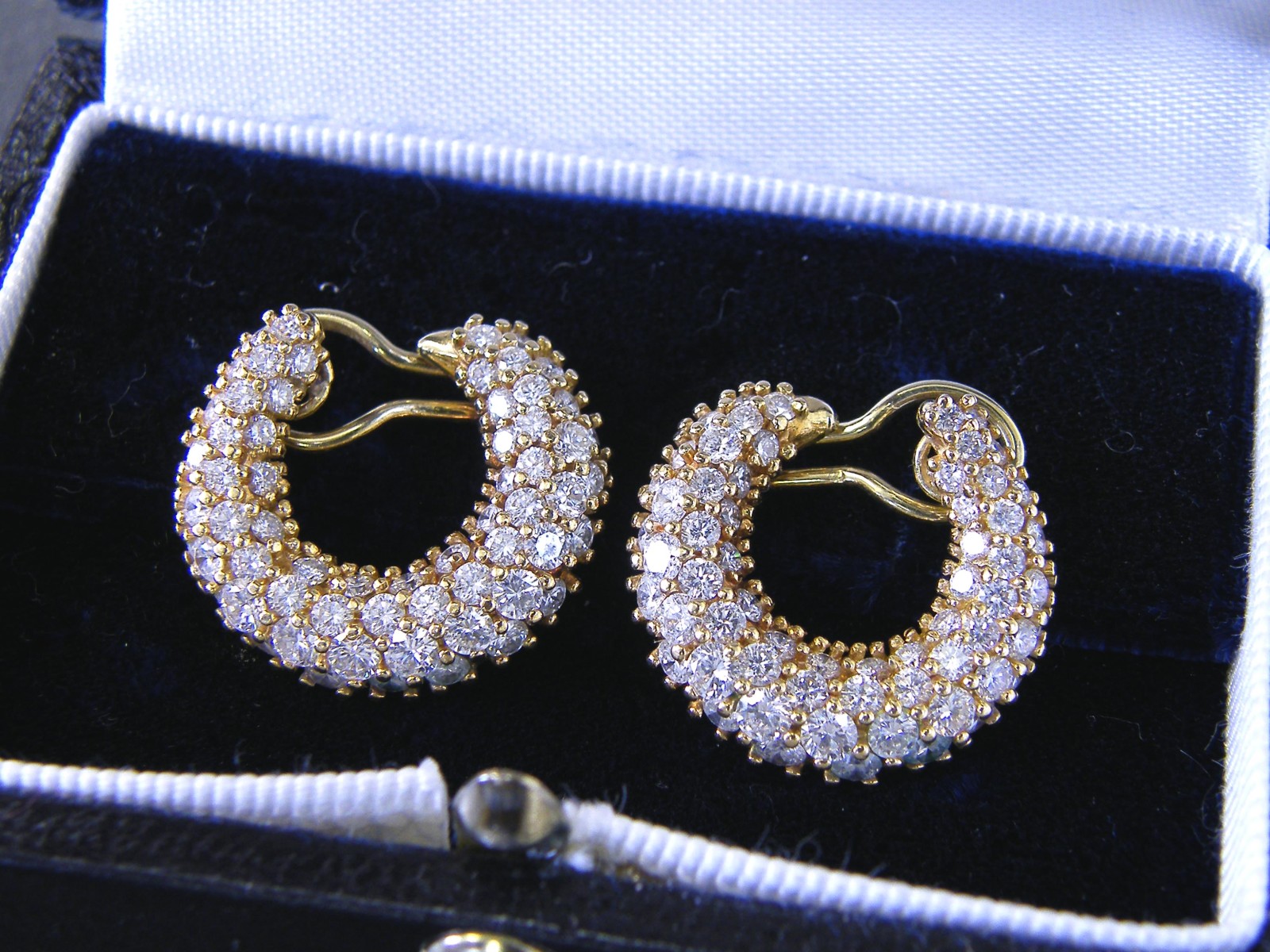 Fine pair of Garrard 18ct diamond crescent earrings, with round brilliant cut diamonds in a yellow