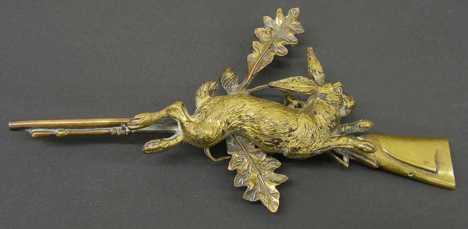 Interesting antique gilded metal paper clip of hunting interest, with applied figure of a leaping
