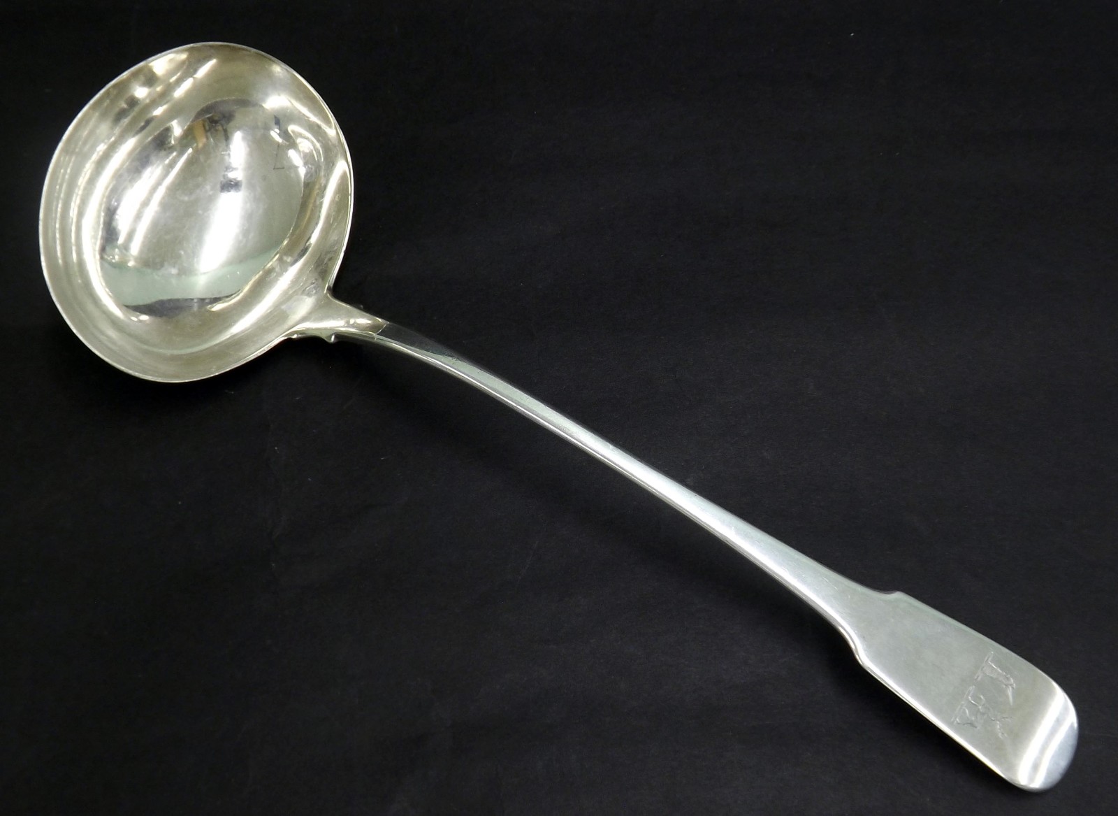 George III silver ladle, engraved with two Crests, maker`s marks indistinct, London 1813, 13"