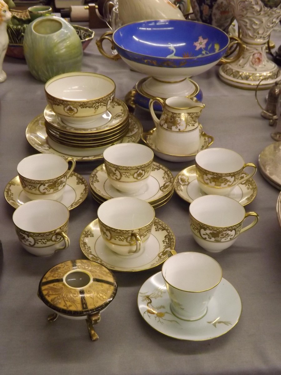 Collection of Noritake porcelain, to include twin handled dish on stand decorated in polychrome with