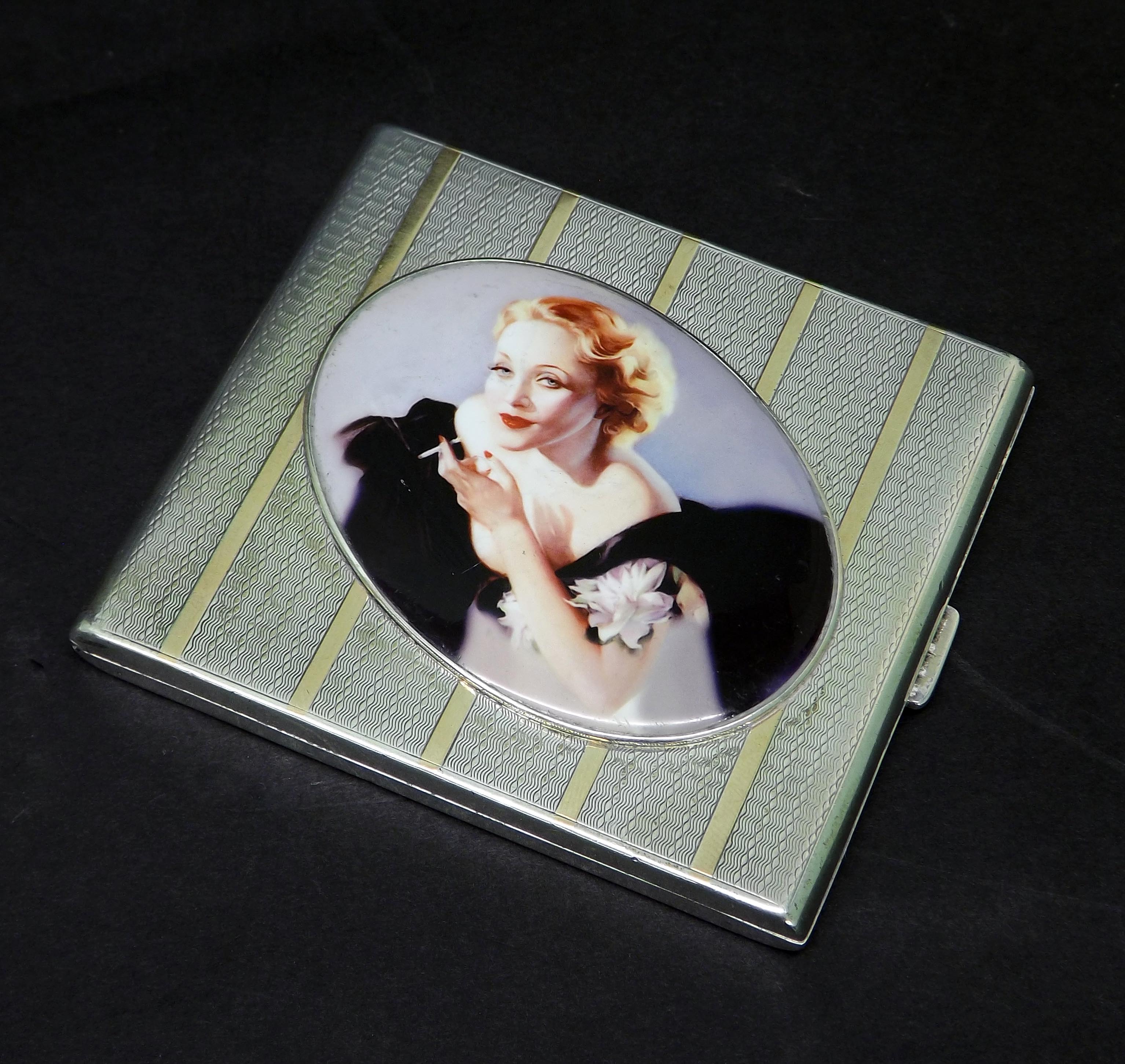 1920s engine turned silver cigarette case fitted with an enamel plaque of a pin-up, maker WN Ltd,