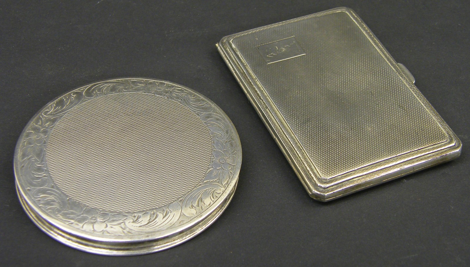 1930s engine turned silver cigarette case, maker N&T, London 1938, 3.25" wide; together with