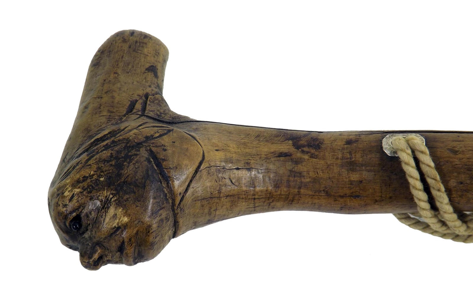 Primitive walking stick, the knop carved in the form of a gentleman`s head with glass eyes and