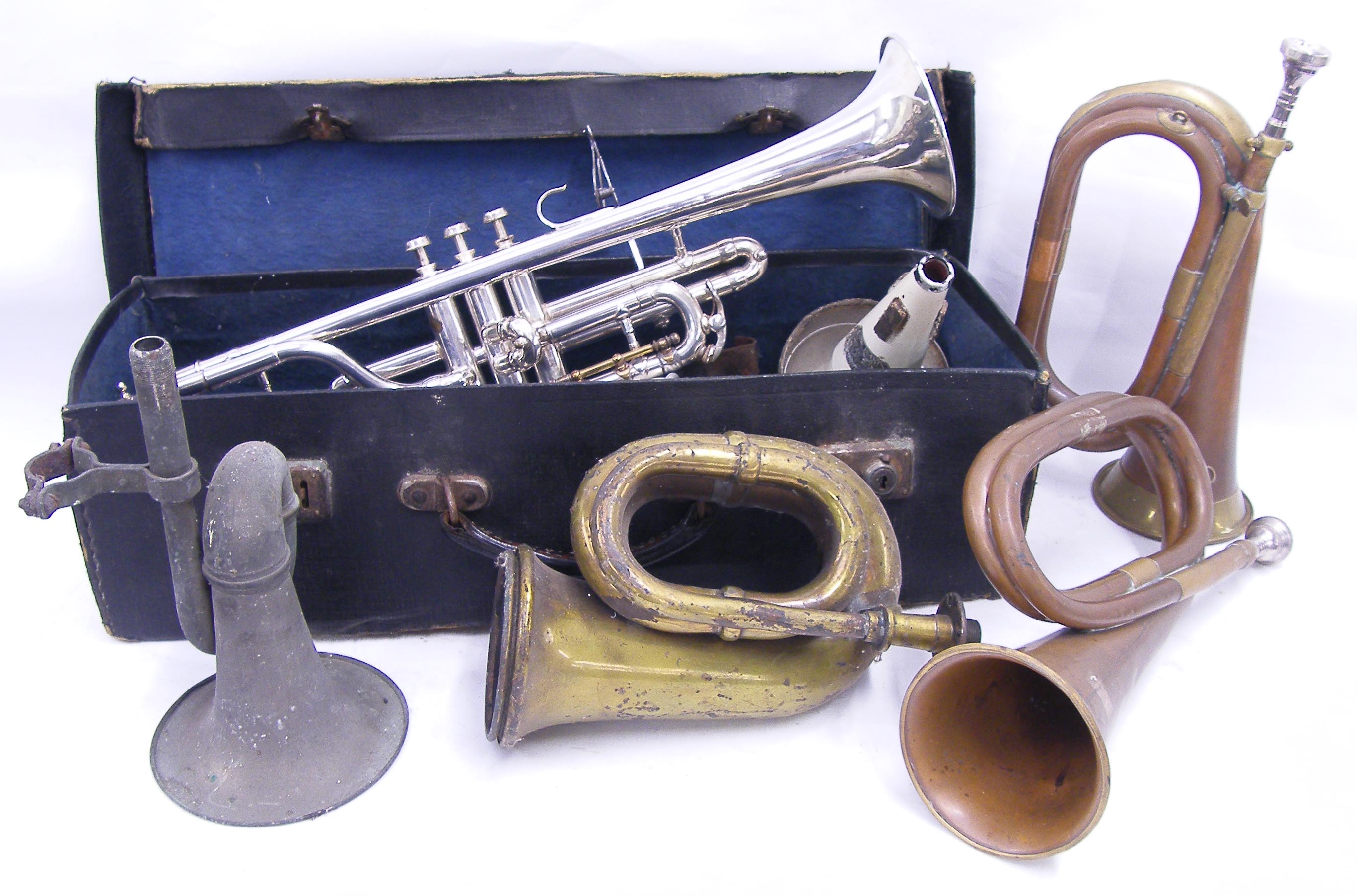 C. Mahillon & Co B flat silver plated trumpet, circa 1920, no. 349, with period mutes and Rudy
