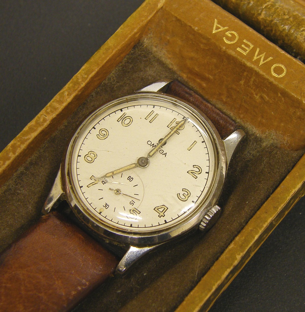 Omega 1940s stainless steel gentleman`s wristwatch, the silvered dial with Arabic numerals and