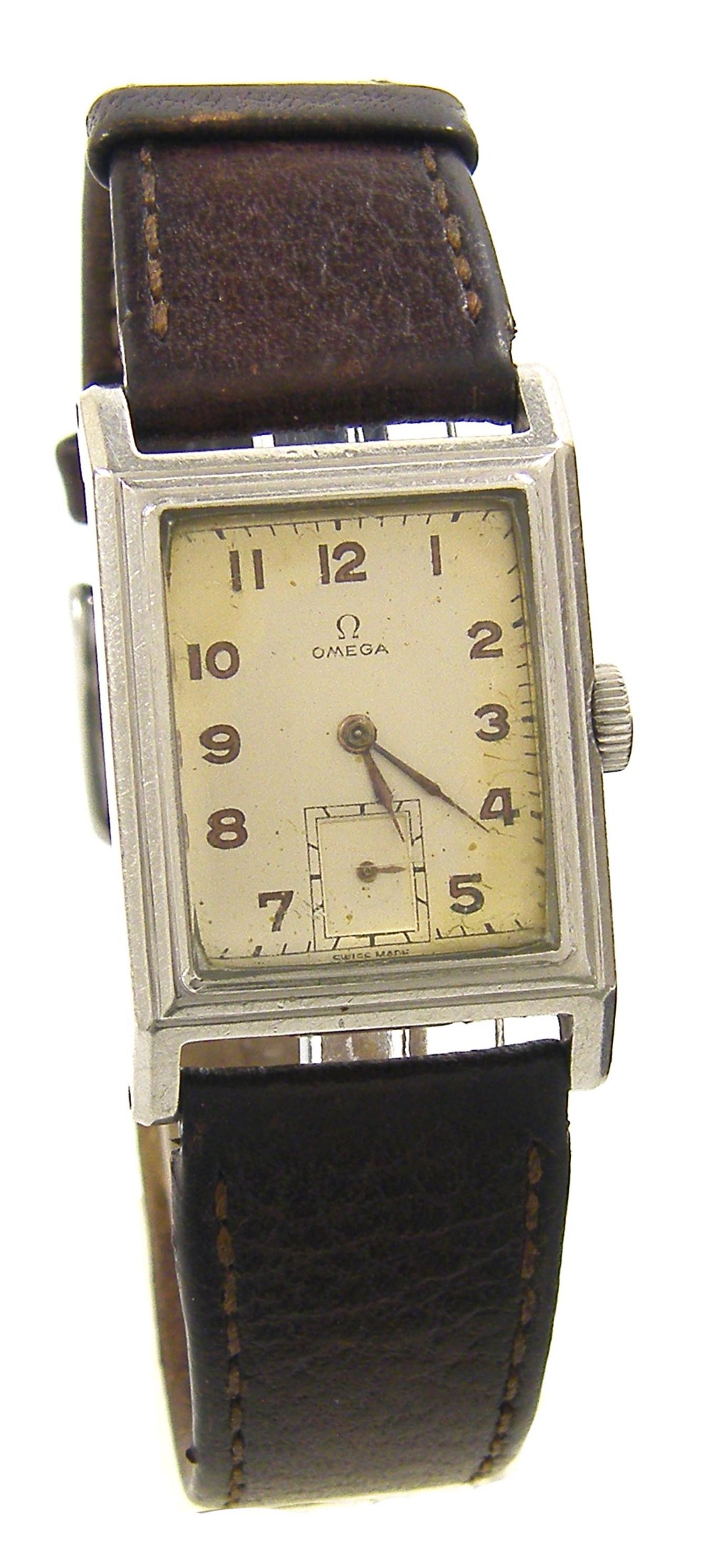 Omega 1940s rectangular gentleman`s wristwatch, the silvered dial with Arabic numerals and