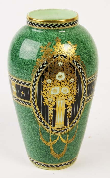 A Royal Worcester vase, with gilt flowers and black and white chevrons against a mottled green