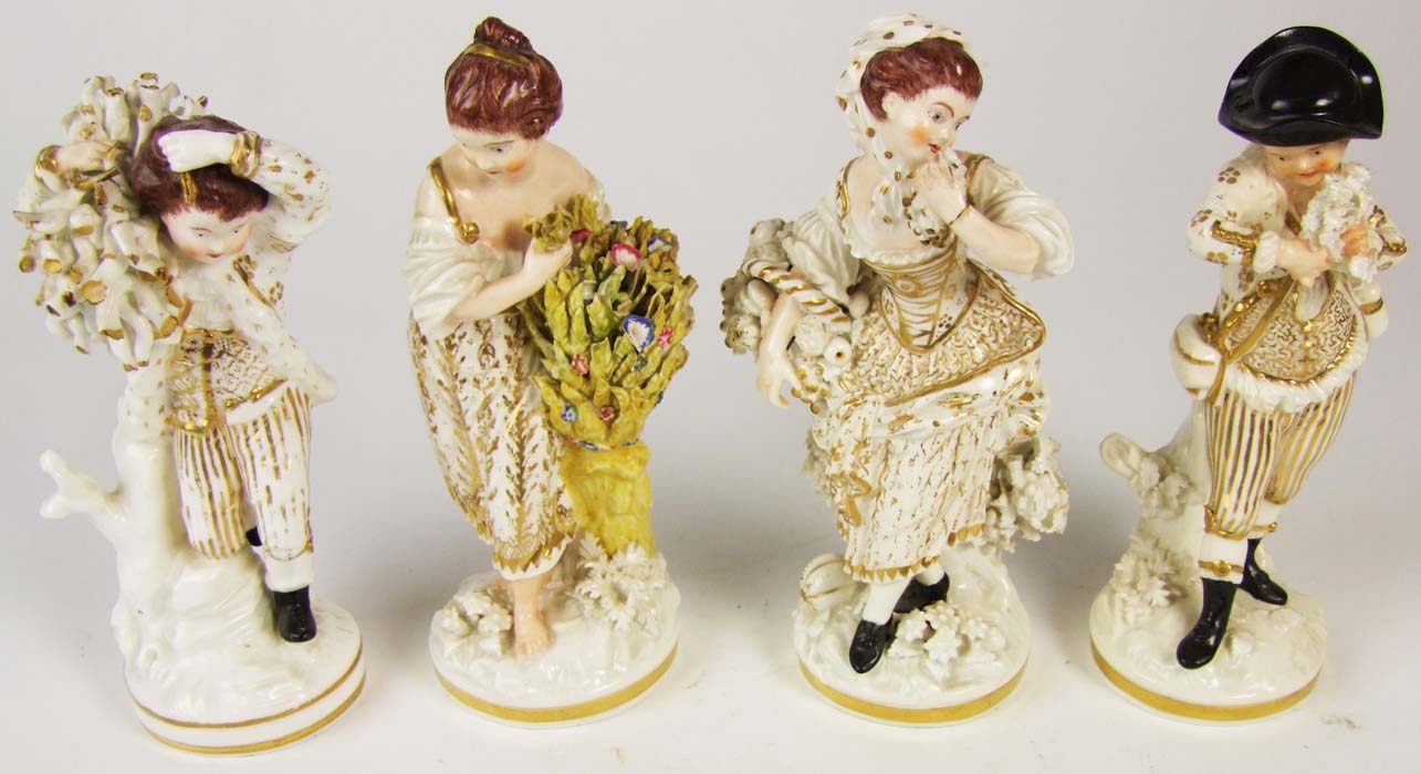 A matched set of four Derby style figures, representing the four seasons, three with a mock Sevres