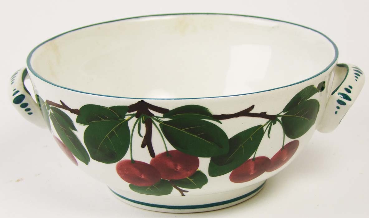 A Wemyss twin handled bowl, painted with cherries and leaves, painted mark beneath, diameter 18cm (