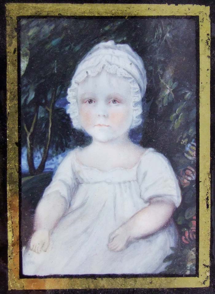 19th Century English School, a portrait miniature of a young child wearing a cap, full face, 8 x 5.