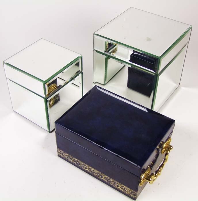 A mirrored square box, width 15cm (6in.), another, and a jewel box. (3).