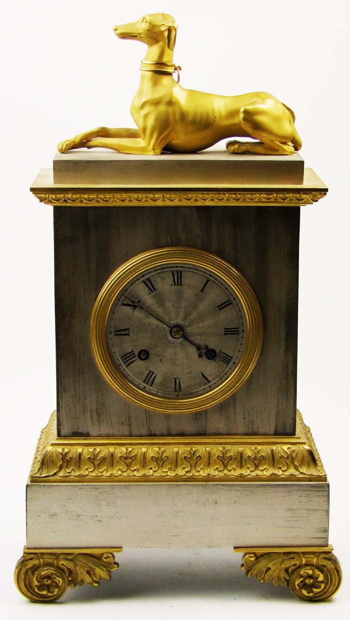 A 19th Century French silvered mantel clock, the dial with roman numerals, the movement signed