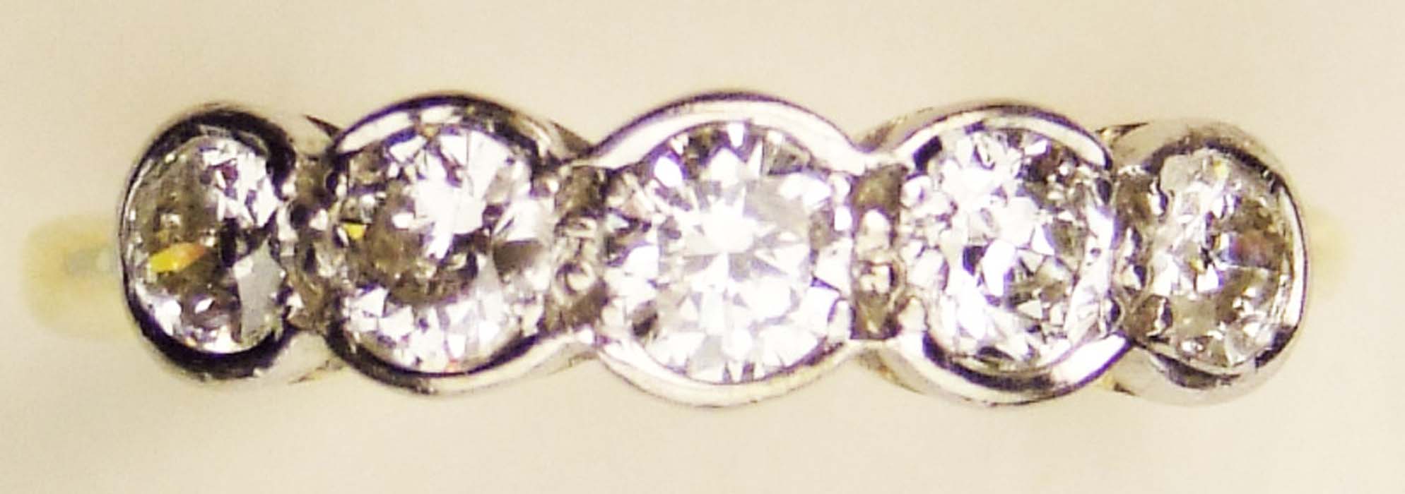 A diamond five stone half hoop ring, the graduated brilliant-cut diamonds in collet setting, to