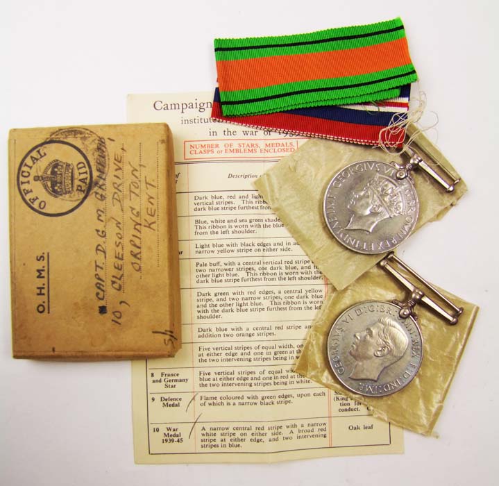 A Defence Medal and a 1939-45 War Medal, in box to Captain D.G.M. Griffiths, with slip.