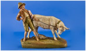 Royal Dux  Bohemia Group Figure `Young Boy Restraining A Young Bull` Circa 1910. 11`` in height,
