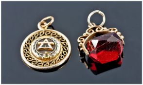 9ct Gold Swivel Fob Set With A Red Faceted Stone, Fully Hallmarked Together With A Yellow Metal