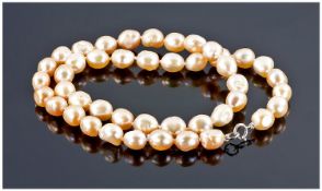 Peach Baroque Freshwater Pearl Necklace, Princess length, each high lustre, pale peach, 6-7mm pearl