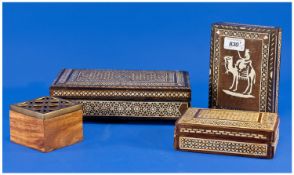 Four Misc Middle Eastern Boxes. Three with inlaid designs in ivory, bone and mother of pearl. One