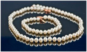Freshwater White Oval Pearl Necklace and Bracelet Set, a 16 inch strand of hand knotted pearls