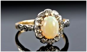 18ct Gold Opal And Diamond Ring, Set With A Central Polished Opal Surrounded By Round Cut Diamonds,