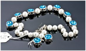 Bright Turquoise Crystal and White Faux Pearl Necklace and Earring Set, the necklace comprising