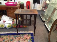 Small Shaped Adapted Mahogany Table, with central glazed cupboard space, above cabriole legs on