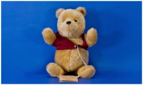 Steiff Classic Mohair Winnie Pooh Figure, with papers. 9.5 inches high. As new condition.