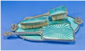 A Delightful Blue And Ornate Ladies Dressing Table Set. Comprises two brushes, hand mirror and