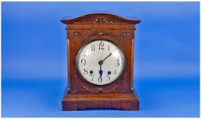 Edwardian Oak Cased Mantel Clock, with 8 day movement with twin striking on two gongs. Silvered