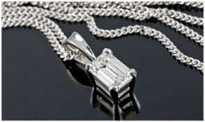 18ct White Gold Set Single Stone Emerald Cut Diamond Pendant and Chain. The colour and clarity of