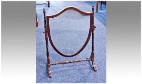 Mahogany Toilet Mirror on Turned Supports with a shield shaped mirror in the Sheraton style. Height