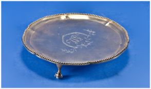 George III Silver Waiter Of Circular Shaped Form With Moulded And Beaded Border, Raised On 3 Ball