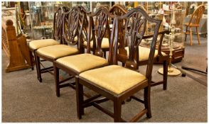 Seven Mahogany Reproduction Hepplewhite Style Wheat Shelf Shield Back Chairs, with lift out