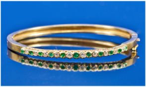 18ct Gold Hinged Bangle, The Front Set With Alternating Round Modern Brilliant Cut Diamonds And