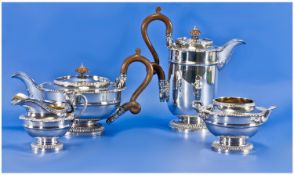 A Very Fine Four Piece Silver Tea And Coffee Set, in the manner of Paul Storr with hammered snake