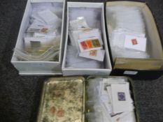 Four Shoe Box Containers of All World Stamps, sorted by country with small packets.