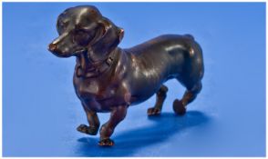 A Bronze Figure of a Sausage Dog. 4.5 inches in length.