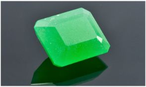 A Single Stone & Unmounted Emerald Cut Jade. The jade of good colour & weighs 19cts.