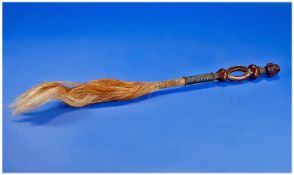 African Hardwood Fly Whisk Of Fine Quality Caving And Pattination. The handle carved with the head