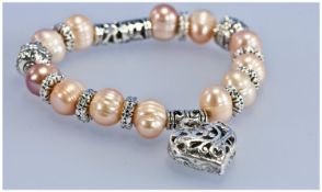 Peach Freshwater Ring Pearl Charm Bracelet, the pale peach pearls with natural ring formations