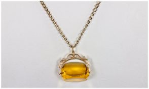 9ct Gold Ladies Yellow Stone Citrine Swivel Pendant Drop fitted on a long 9ct gold curb chain.