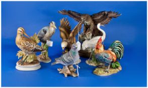 Collection Of Ceramic Bird Figures 8 in total, including pigeon, crane, eagle, heron, cockerel etc.